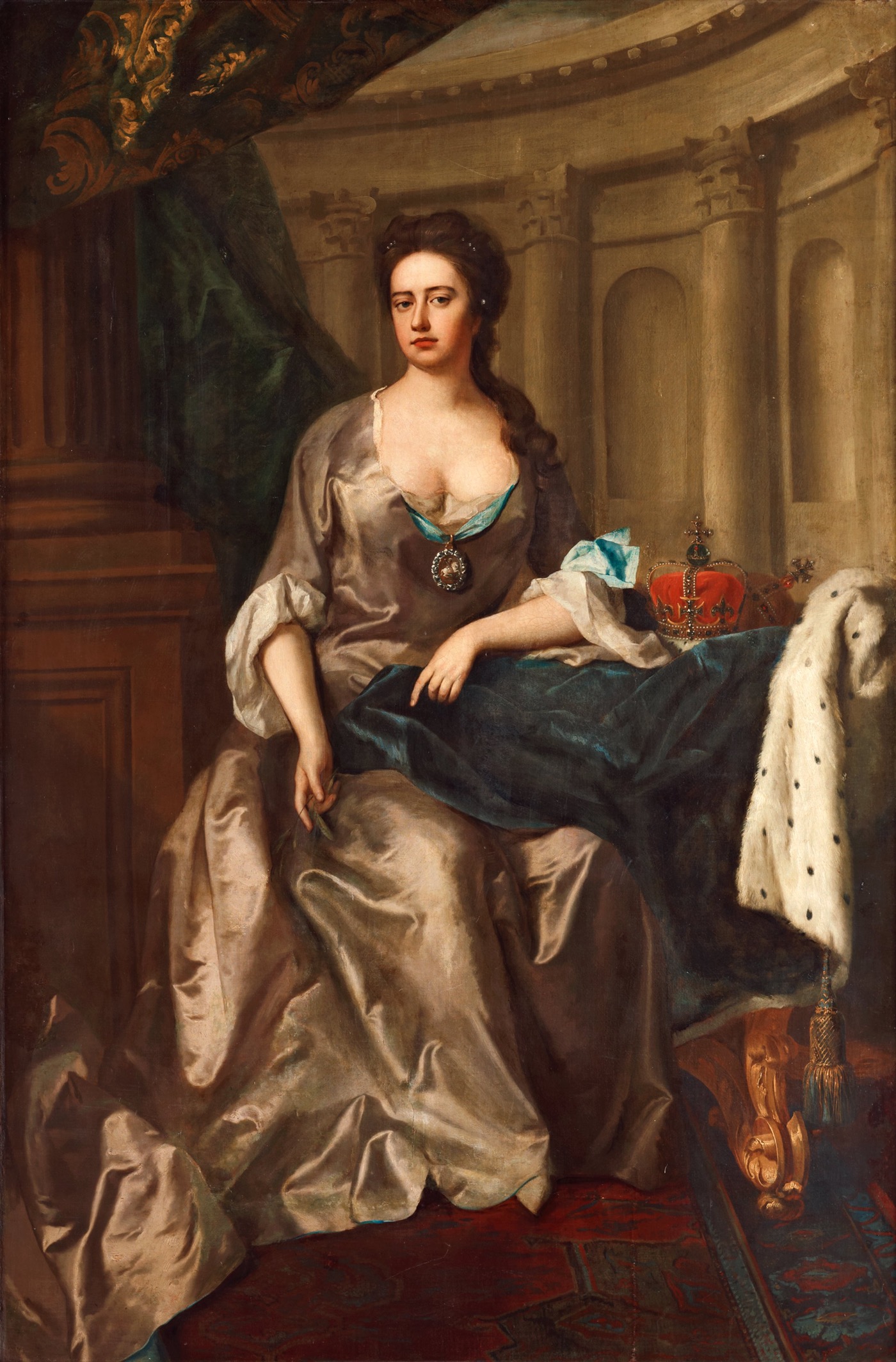Queen Anne of Great Britain, seated in silver silk with crown at her side — portrait by Michael Dahl.