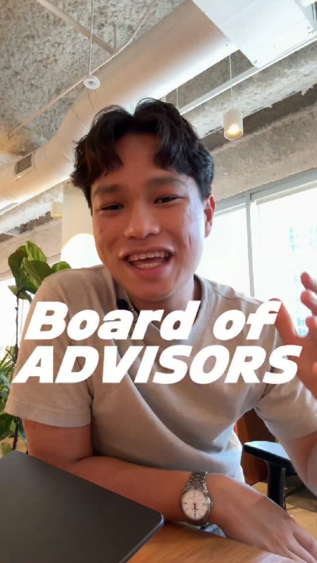 Fintok presenter seated at a table with the title “Board of ADVISORS”.