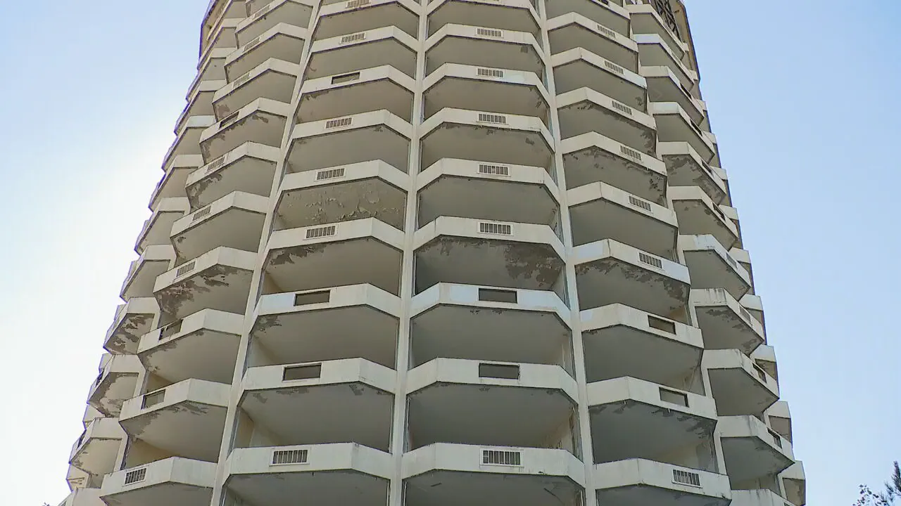 Stripped exterior of the Presidential Hotel in October 2026, photographed by WSB-TV