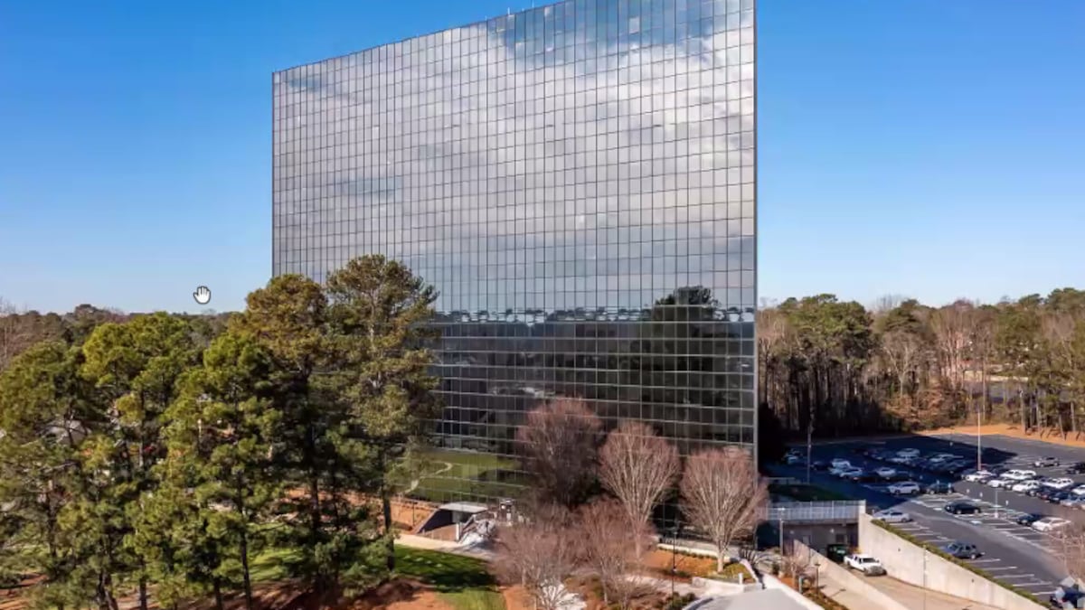 Archive view of the existing office tower published alongside its 2024 apartment proposal